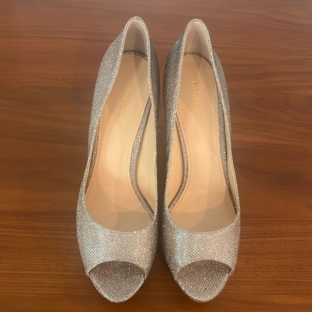 Size 12 Enzo Angolini, Gold. Never worn, only tried on in home. Approx. 3" heel.